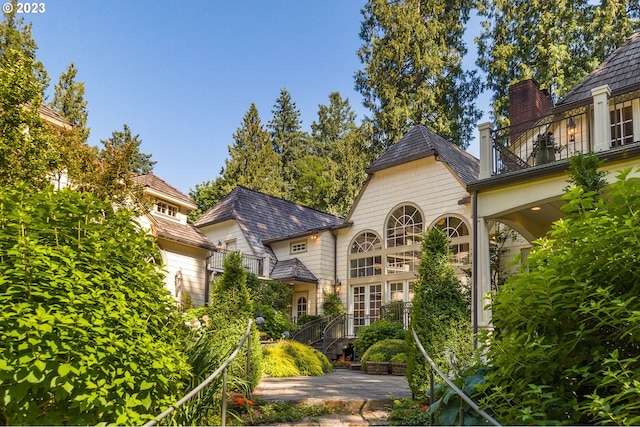 view of front of house with a balcony