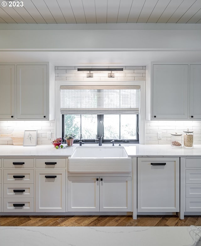 33723 Van Duyn Rd, Eugene, OR 97408 - kitchen featuring a sink, plenty of natural light, decorative backsplash, light countertops, and wood ceiling