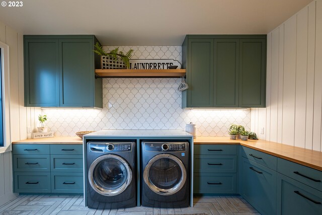 33723 Van Duyn Rd, Eugene, OR 97408 - clothes washing area featuring cabinet space and independent washer and dryer