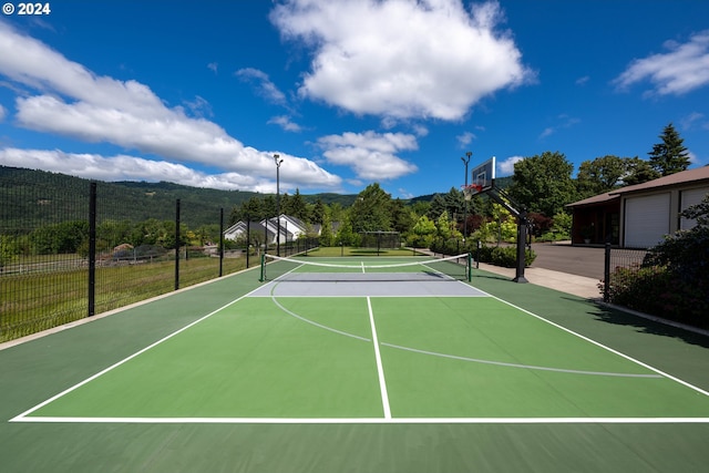 33723 Van Duyn Rd, Eugene, OR 97408 - view of tennis court with fence, community basketball court, and a mountain view