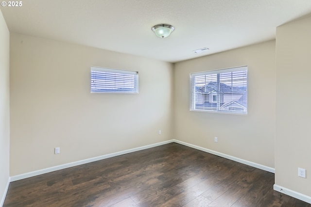7359 NW 168th Ave, Portland, OR 97229 - unfurnished room with dark wood finished floors and baseboards