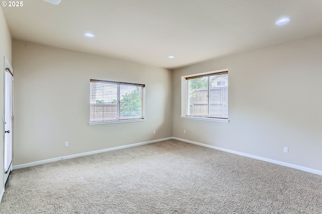 7359 NW 168th Ave, Portland, OR 97229 - carpeted empty room featuring plenty of natural light and recessed lighting
