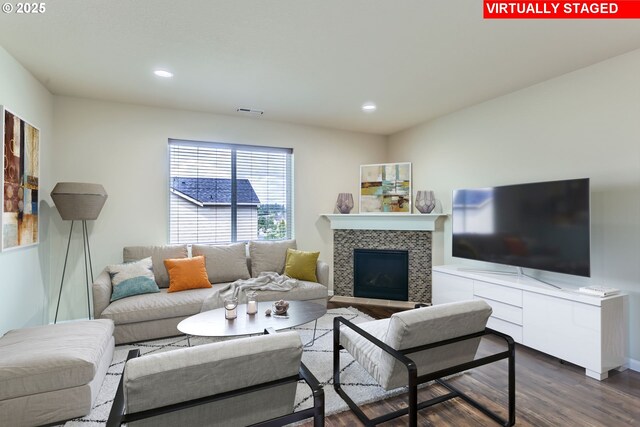 7359 NW 168th Ave, Portland, OR 97229 - living area with dark wood-style floors, recessed lighting, and a fireplace