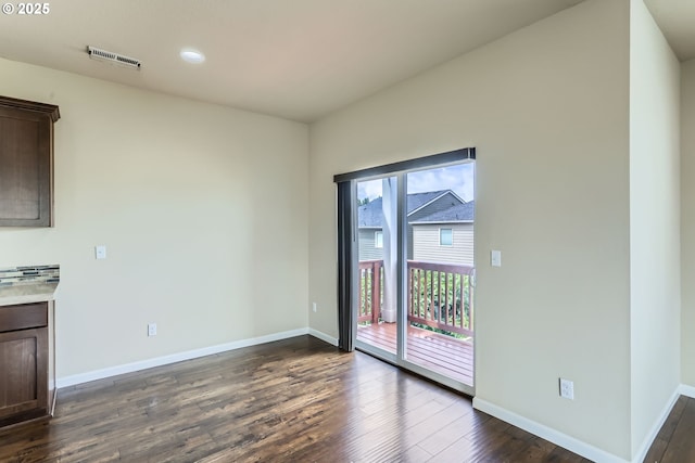 7359 NW 168th Ave, Portland, OR 97229 - unfurnished dining area with dark wood finished floors and recessed lighting