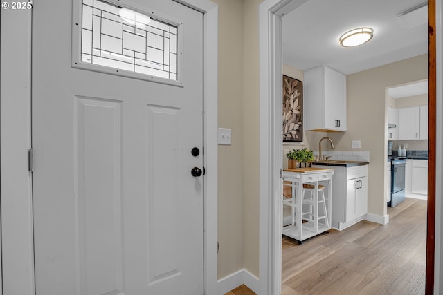 entryway featuring light hardwood / wood-style floors