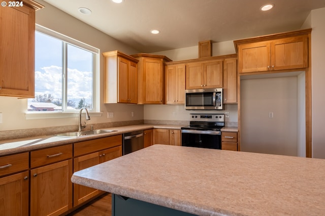 223 N Johnson St, Prairie City, OR 97869 - kitchen featuring appliances with stainless steel finishes, light countertops, and recessed lighting