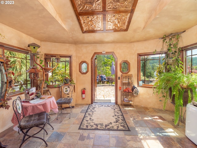 property entrance with a patio