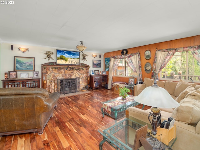 living room featuring hardwood / wood-style floors and a fireplace