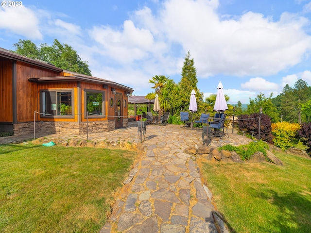 view of yard with a patio area