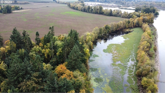 aerial view featuring a rural view and a water view