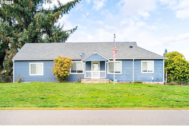 single story home with a front lawn