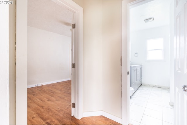 hall featuring light hardwood / wood-style flooring