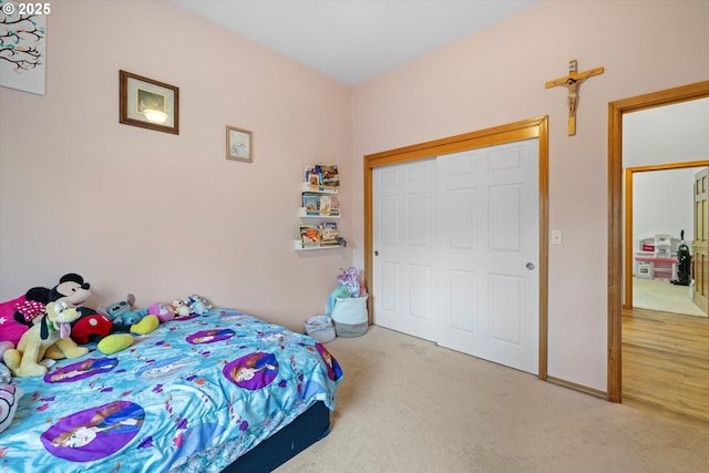 bedroom with a closet and carpet flooring