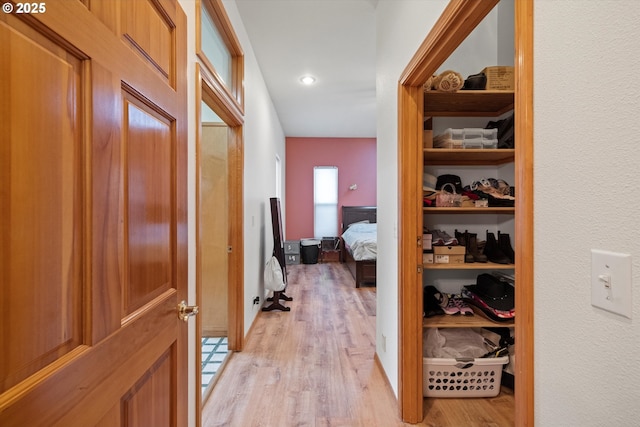 hall featuring light hardwood / wood-style floors