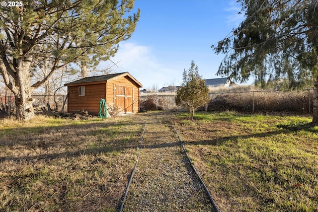 view of yard with a storage shed