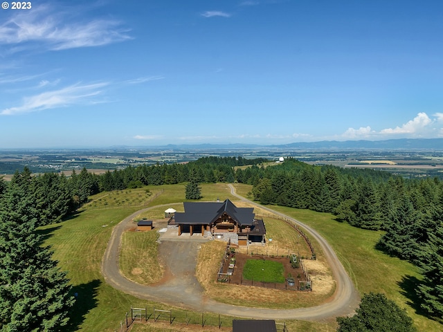 birds eye view of property featuring a rural view