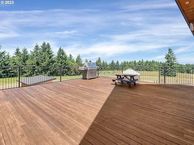 wooden terrace with grilling area