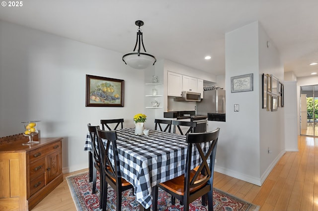 5250 S Landing Dr Unit 111B1, Portland, OR 97239 - dining space with light wood-style floors and recessed lighting