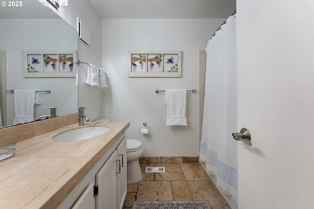 5250 S Landing Dr Unit 111B1, Portland, OR 97239 - full bathroom featuring vanity, stone tile floors, and a shower with curtain