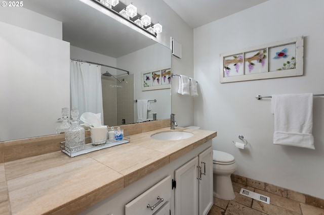 5250 S Landing Dr Unit 111B1, Portland, OR 97239 - bathroom featuring vanity, stone tile floors, and a shower with curtain