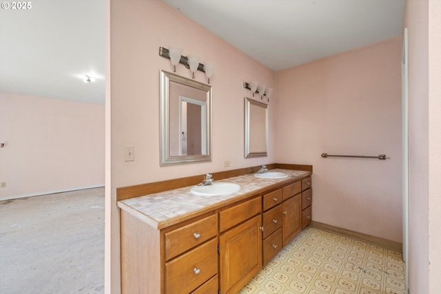 11185 SE Saint Lucy Ln, Happy Valley, OR 97086 - bathroom with double vanity and baseboards