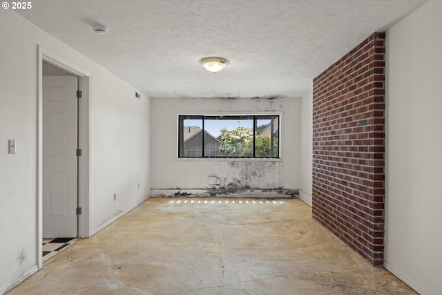 11185 SE Saint Lucy Ln, Happy Valley, OR 97086 - spare room with a smoke detector and a textured ceiling