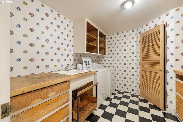 11185 SE Saint Lucy Ln, Happy Valley, OR 97086 - laundry area featuring washer and dryer, tile patterned floors, and wallpapered walls