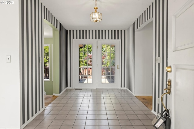 11185 SE Saint Lucy Ln, Happy Valley, OR 97086 - entrance foyer featuring wallpapered walls and light tile patterned floors