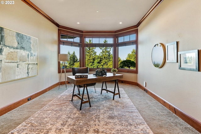 office area with crown molding and light wood-type flooring