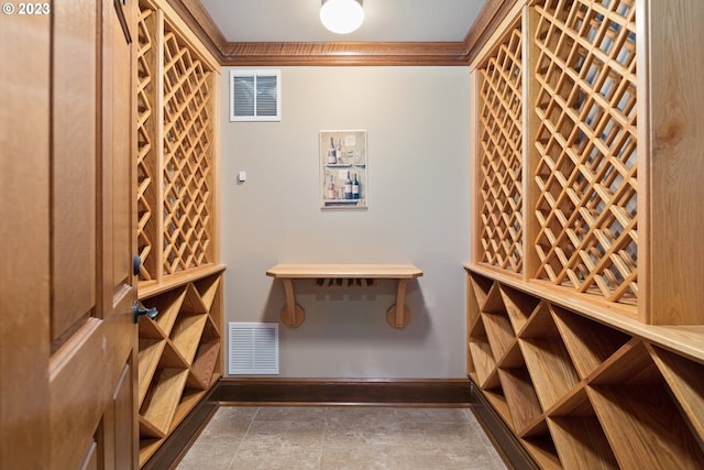 wine room with dark tile flooring