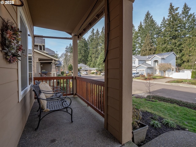 balcony featuring covered porch