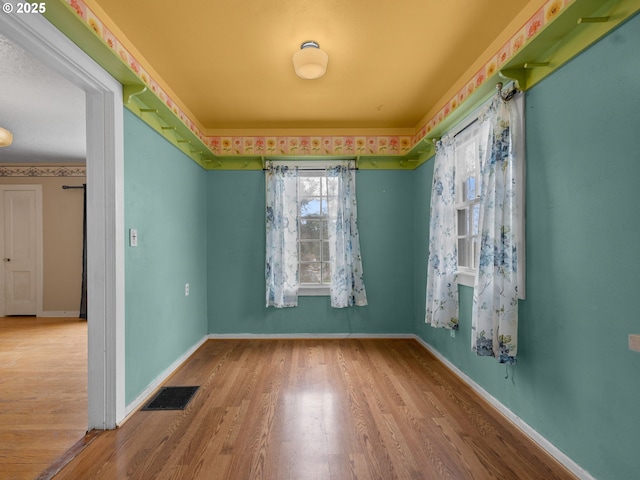510 SE Shafford St, Estacada, OR 97023 - unfurnished room featuring visible vents, baseboards, and wood finished floors