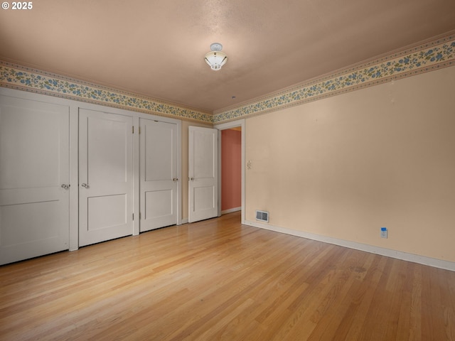 510 SE Shafford St, Estacada, OR 97023 - unfurnished bedroom featuring visible vents, baseboards, and light wood-style floors