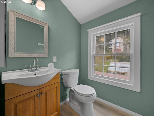 510 SE Shafford St, Estacada, OR 97023 - half bathroom featuring toilet, wood finished floors, vanity, and baseboards