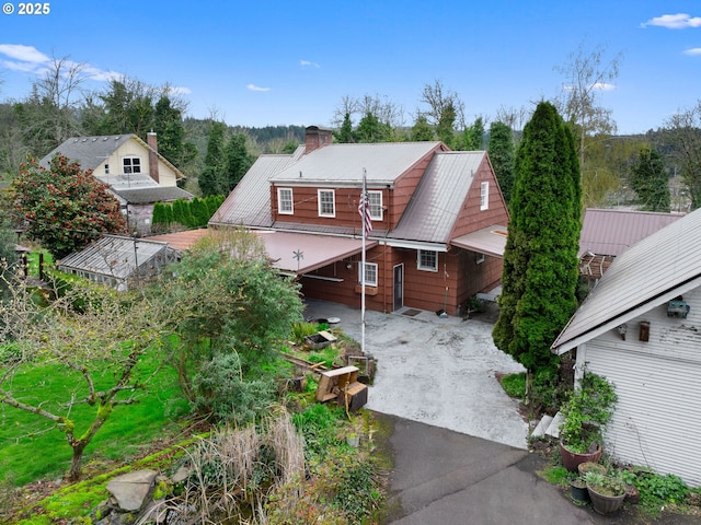 510 SE Shafford St, Estacada, OR 97023 - rear view of property with a chimney and aphalt driveway