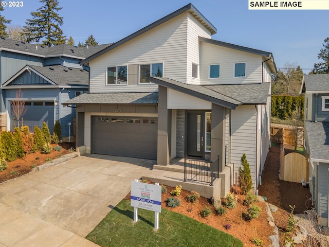 view of front of property featuring a garage