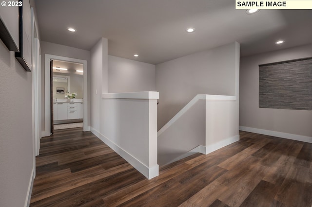 hallway featuring dark hardwood / wood-style floors