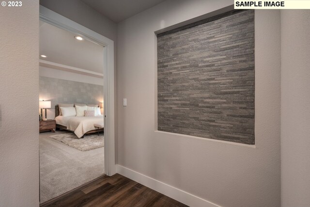 unfurnished bedroom featuring dark wood-type flooring