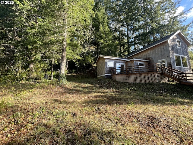 view of yard with a deck