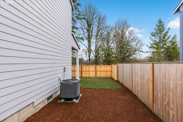 view of yard featuring central AC unit