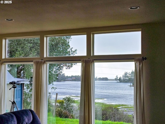 654 Madrona Ave, Port Orford, OR 97465 - entryway with a water view, recessed lighting, and healthy amount of natural light