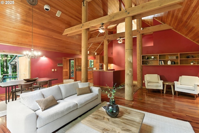 25901 E Highview Dr, Welches, OR 97067 - living room with wood ceiling, decorative columns, wood finished floors, vaulted ceiling, and a ceiling fan
