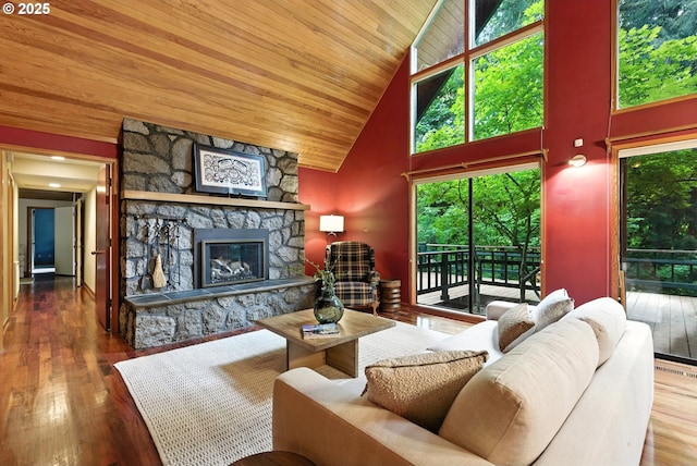 25901 E Highview Dr, Welches, OR 97067 - living room featuring high vaulted ceiling, a fireplace, wood ceiling, and hardwood / wood-style floors