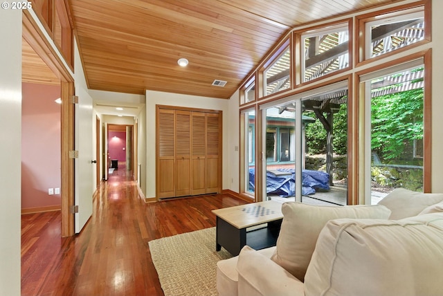 25901 E Highview Dr, Welches, OR 97067 - living area featuring vaulted ceiling, wood ceiling, and wood finished floors