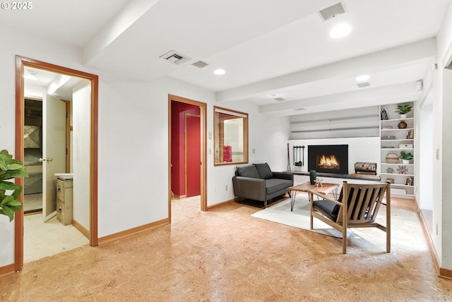25901 E Highview Dr, Welches, OR 97067 - living room with light colored carpet, a warm lit fireplace, and recessed lighting