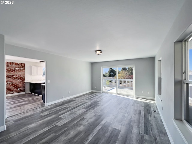 interior space with dark hardwood / wood-style floors