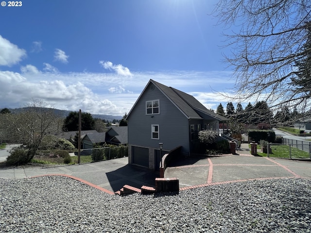 view of home's exterior with a garage