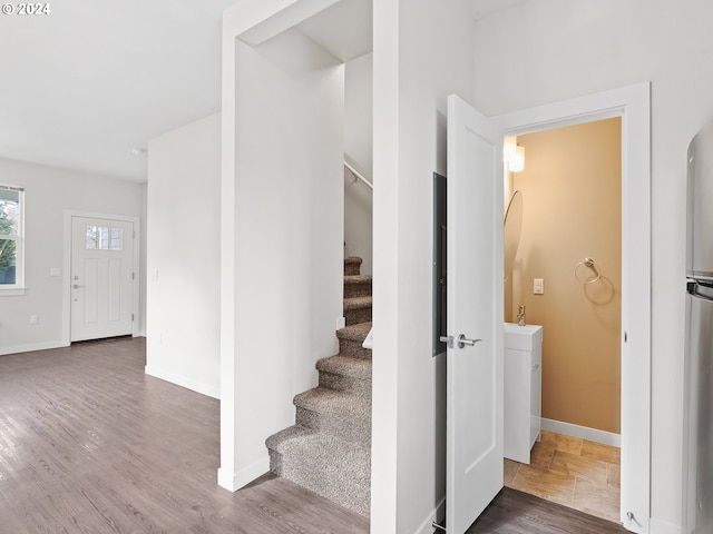 staircase with dark wood-type flooring