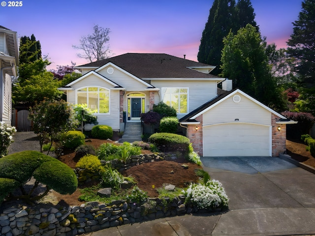 16438 SW Oneill Ct, Portland, OR 97223 - view of front of property featuring driveway and a garage