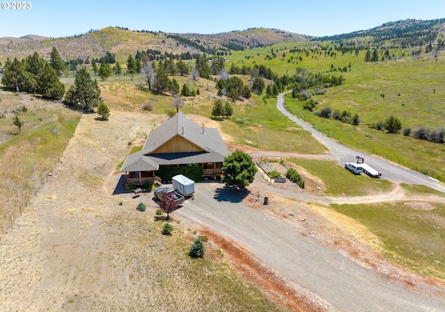 aerial view featuring a mountain view and a rural view